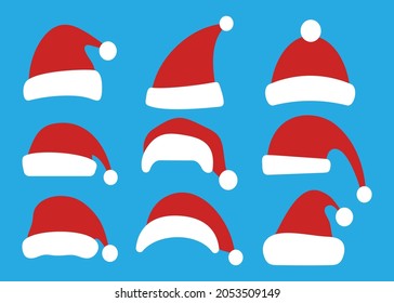 Set of Christmas hats isolated on blue background. Santa Claus hat bundle. New Year and Christmas decoration element. Vector illustration.