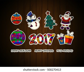 Set of Christmas icons and holiday decorative design elements, symbols, badges,stickers, patches on wood background. Christmas tree, ornaments, snowman, santa claus, presents, 2017, greetings. 