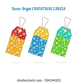 Set of Christmas labels with background from snowflakes. Red yellow, blue yellow, and cyan green colors labels. Element for your Christmas designs, projects, promotional sales and other your projects