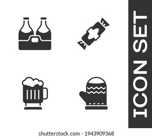 Set Christmas mitten, Champagne bottle, Wooden beer mug and Candy icon. Vector