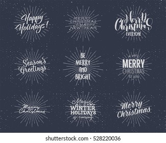 Set of Christmas , New Year 2017 lettering, wishes, sayings and vintage labels. Season's greetings calligraphy. Holiday typography design. Vector isolated on dark. Letters composition with sun bursts