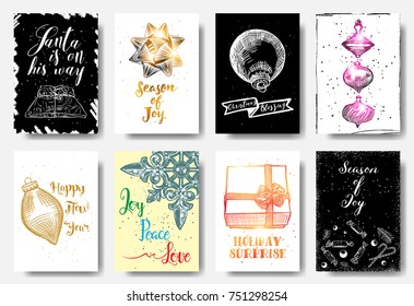 Set of Christmas and New Year greeting cards with handwritten brush calligraphy and decorative elements. Decorative hand drawn illustration for winter invitations, cards, posters and flyers. Vector.