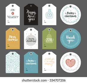 Set of Christmas and New year tags with hand drawn lettering and holiday decoration elements. Xmas gift tags on gray background