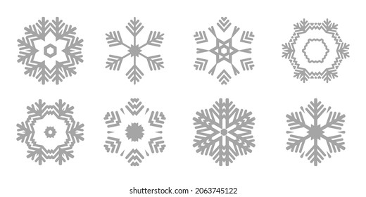Set of Christmas and New Year's snowflakes in gray. Vector illustration isolated on white background.