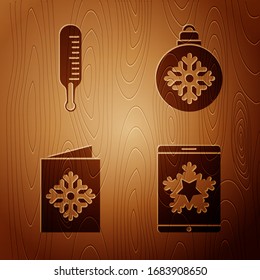 Set Christmas on smartphone and snowflake, Meteorology thermometer measuring, Christmas postcard and Christmas ball on wooden background. Vector