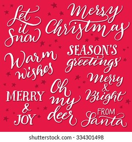 Set of christmas quotes for greeting cards on red background. Handwritten vector calligraphy.