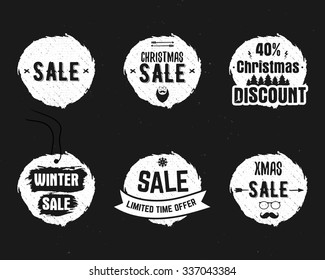 Set of Christmas sale ink, watercolor banners, labels, badges, stamps with a winter shopping tag and snowflake and other elements. New year discount coupons, card. Hand drawn design. Vector.