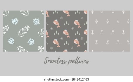Set of christmas seamless patterns with baby whale in santa hat and with winter branches and snowflakes . Vector illustration