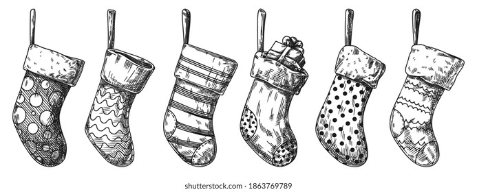 Juego de medias de Navidad. Calcetines diferentes aislados en fondo blanco. Esbozo, vector