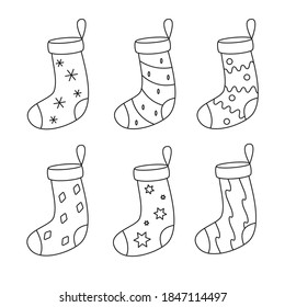 Set of Christmas socks for a gift, black and white outline. vector illustration.