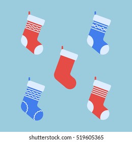 Set of Christmas socks isolated on blue background. Stocking flat style icons. Vector illustration.