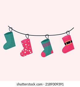 A set of Christmas socks for presents on a string. Vector illustration