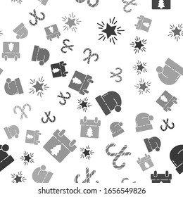 Set Christmas star, Christmas candy cane with stripes, Christmas Santa Claus hat and Calendar on seamless pattern. Vector