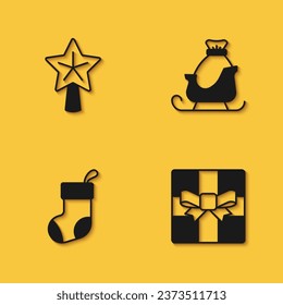 Set Christmas star, Gift box, stocking and santa claus sleigh icon with long shadow. Vector