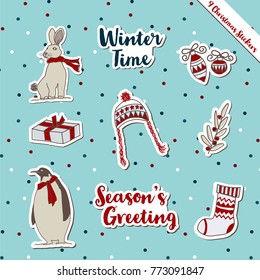 A set of Christmas stickers, scrapbook, gift tags with text, bunny, penguin, bobble hat, sock, warm wish items, wool, holly jolly celebration, decorated scrapbook wrapping paper season greeting.
