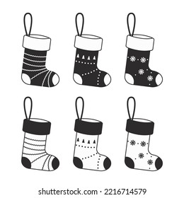 Set of Christmas stockings in black and white colors. Cartoon flat style. Vector illustration