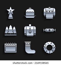 Set Christmas sweater, stocking, wreath, Candy, Calendar, trees,  and star icon. Vector