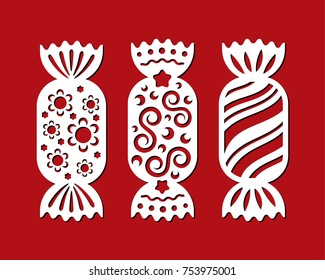 Set of Christmas sweets. Template candy for laser cutting, wood carving. Vector silhouette bonbon on red background. Openwork toy with cutout lace ornament. Decorative icons with flower, star, curl.