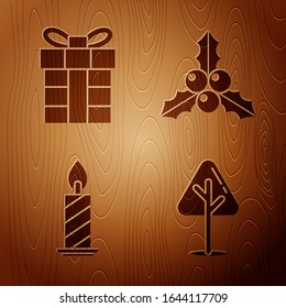Set Christmas tree, Gift box, Burning candle in candlestick and Branch viburnum or guelder rose on wooden background. Vector