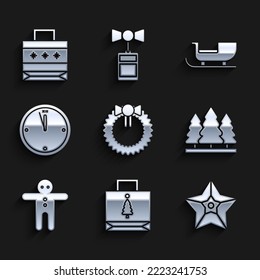 Set Christmas wreath, paper shopping bag, star, trees, Holiday gingerbread man cookie, Clock, santa claus sleigh and  icon. Vector