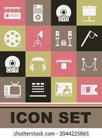 Set Cinema ticket, Rope barrier, Microphone, CD or DVD disk, Movie spotlight, Film reel, clapper and Home stereo with two speakers icon. Vector