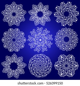 Set of circular vector patterns. Ornamental lace snowflakes. Indian mandala style. Elements for design can be used for decorating of invitations, cards, decoration, Christmas illustration