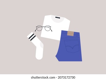 A set of classic casual clothes, blue jeans, a white t-shirt, striped socks and a simple metal frame