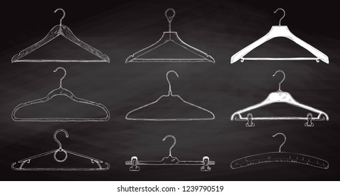 Set of clothes hangers on a chalkboard. Vector