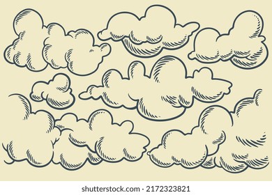 set of clouds in hand drawn vintage retro style isolated on white background. Cartoon design elements.