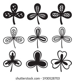 Set of clover or trefoil or shamrock leaves, St Patrick Day symbol. Silhouette vector illustrations isolated on the white background.
