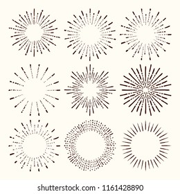 Set and collection of trendy hand drawn retro sunburst/bursting rays design elements.