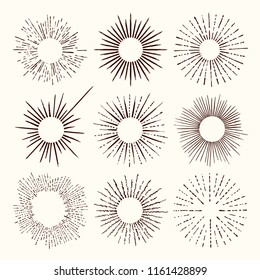 Set and collection of trendy hand drawn retro sunburst/bursting rays design elements.