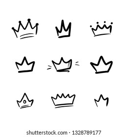 Set, collection of vector doodle, hand drawn crowns isolated on white background.