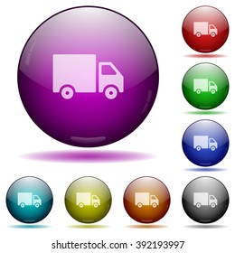 Set of color delivery glass sphere buttons with shadows.