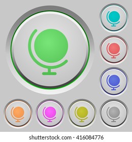 Set of color globe sunk push buttons.