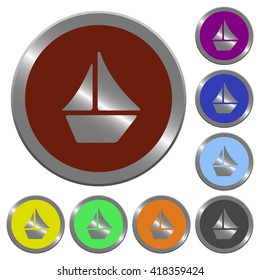Set of color glossy coin-like sailboat buttons.