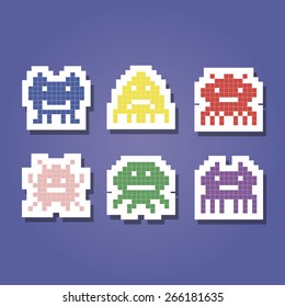 set of color icons with pixel alien monsters