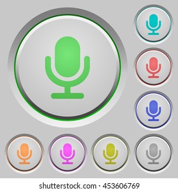 Set of color microphone sunk push buttons.
