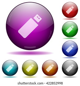 Set of color pendrive glass sphere buttons with shadows.