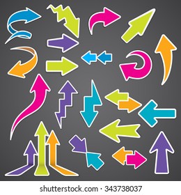 Set of colored arrows on a dark background. Vector illustration eps 10