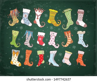 Set of colored doodle christmas gift socks on green background.