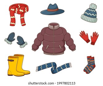 A set of colored doodles. Outerwear, down jacket, sweater, hat, scarf, boots, gloves, socks. Warm autumn clothes. Decorative elements with a stroke and fill. Vector illustration isolated on white