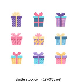 Set of colored gift boxes with ribbon. Hand drawn doodle collection isolated on white. Beautiful festive packaging for Happy Birthday, Christmas.