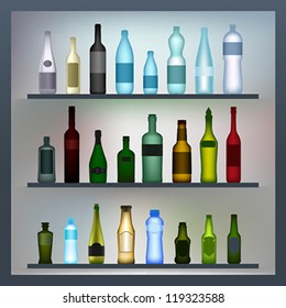 Set of colored glass and plastic bottles