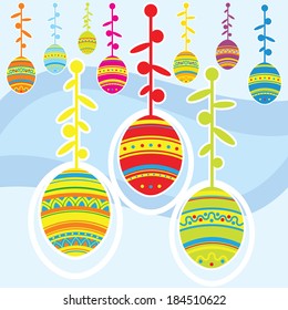 Set of colored hanging easter eggs on a background