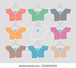 Set of colored icons: nine little baby or doll skirts on crutch