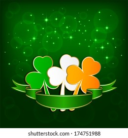 Set of colored leaves of a clover on green background with ribbon, illustration.