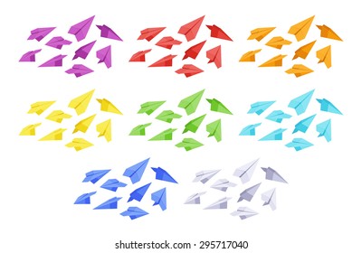 Set of the colored paper planes. The objects are isolated against the white background and shown from different sides