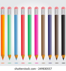 Set of colored pencils on a gray background vector