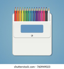 A set of colored pencils in a white pocket with a label and a button. Pencils for drawing rainbow colors. School stationery for decoration